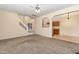 Open living room with a view of the kitchen and staircase at 2124 Star Sapphire Dr, Raleigh, NC 27610
