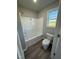 Bathroom with a shower/tub combo and vinyl flooring at 29 Pate Landing Dr, Selma, NC 27576