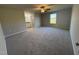 Spacious bedroom with an en-suite bathroom and large window at 29 Pate Landing Dr, Selma, NC 27576