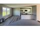 Modern kitchen with white shaker cabinets, granite countertops, and stainless steel appliances at 29 Pate Landing Dr, Selma, NC 27576