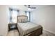 Spacious bedroom with ceiling fan and ample natural light at 407 Eagle Ct, Henderson, NC 27536