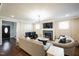 Spacious living area with hardwood floors and fireplace at 407 Eagle Ct, Henderson, NC 27536