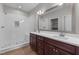 Bathroom features double vanity and walk-in shower at 55 Sterling Dr, Franklinton, NC 27525