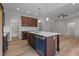 Modern kitchen with an island and stainless steel appliances at 55 Sterling Dr, Franklinton, NC 27525