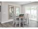 Bright dining area with a table and chairs, near sliding glass doors at 612 Matthiola Dr, Wendell, NC 27591