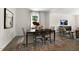 Bright dining room features a table with four chairs and a stylish area rug at 87 Ethel Ln, Angier, NC 27501