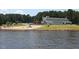 Large clubhouse with sandy beach area and plenty of space for relaxation at 109 Lone Star Dr, Louisburg, NC 27549