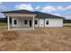 House exterior showcasing a covered patio and backyard at 120 Lemon Drop Ln, Franklinton, NC 27525