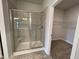 Large walk-in shower with glass enclosure and built-in seat at 120 Lemon Drop Ln, Franklinton, NC 27525