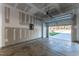 Unfinished garage interior with open garage door at 1430 Cooper St, Sanford, NC 27330