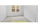 Bright bedroom with carpeted floors and a large window at 169 Running Deer Dr, Louisburg, NC 27549