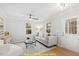 Light and airy living room with wood floors at 169 Running Deer Dr, Louisburg, NC 27549