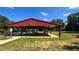 Outdoor fitness area with covered pavilion and exercise equipment at 169 Running Deer Dr, Louisburg, NC 27549