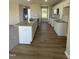 Modern kitchen with granite countertops and white cabinets at 186 Pate Landing Dr, Selma, NC 27576