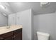 Small bathroom with toilet and vanity at 237 Sweet Violet Dr, Holly Springs, NC 27540