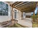 Wooden pergola and patio area next to house at 237 Sweet Violet Dr, Holly Springs, NC 27540