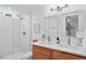 Elegant bathroom with double vanity and large shower at 2415 Huron St, Durham, NC 27707