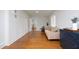 Long hallway with white built-in cabinets and hardwood floors at 2618 Wade Ave, Raleigh, NC 27607