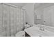 Clean bathroom with shower/tub combo and patterned curtain at 268 Misty Pike Dr, Raleigh, NC 27603