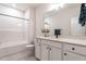 Clean bathroom with white vanity, quartz countertop, and a large mirror at 35 Welcome Dr, Fuquay Varina, NC 27526