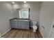 Double vanity bathroom with granite countertop at 36 Holly Grove Ln, Lillington, NC 27546