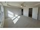 Bright bedroom with carpet flooring and large windows at 36 Holly Grove Ln, Lillington, NC 27546