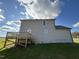 Two-story house with wooden deck and siding at 36 Holly Grove Ln, Lillington, NC 27546