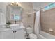 Clean bathroom with white vanity, subway tile, and a soaking tub at 4105 Summer Brook Dr, Apex, NC 27539