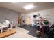 Unfinished basement with storage shelving and flooring at 4129 Gardenlake Dr, Raleigh, NC 27612