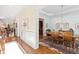 Hallway view of dining room and staircase at 4129 Gardenlake Dr, Raleigh, NC 27612