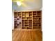 Built-in wooden bookshelves in a home office at 504 Summitt Dr, Sanford, NC 27330