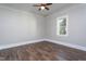 Bright bedroom with hardwood floors and neutral walls at 704 Pender St, Rocky Mount, NC 27801