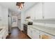 Updated kitchen features stainless steel appliances and white shaker cabinets at 9100 Greenbriar Sta, Chapel Hill, NC 27516