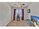 Bedroom with desk, TV, and view of the backyard at 105 Valleycruise Cir, Garner, NC 27529