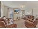 Bonus room with two leather recliners and a large TV at 105 Valleycruise Cir, Garner, NC 27529
