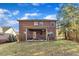 Brick house exterior with covered patio and yard at 105 Valleycruise Cir, Garner, NC 27529