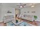 Spacious living room with hardwood floors, a fireplace, and neutral-toned furniture at 105 Valleycruise Cir, Garner, NC 27529