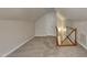 Bonus room with carpet, staircase, and ample space at 1112 Minnie Dr, Raleigh, NC 27603