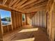 Under construction bedroom with window and outside view at 142 Batten Hill Ln, Selma, NC 27576