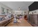 Spacious living room with hardwood floors and a view into dining area at 161 Pine Cone Dr, Oxford, NC 27565