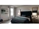 Elegant bedroom with a plush bed and modern decor at 1739 Aspen River Lane, Apex, NC 27502