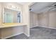 Bathroom vanity with a large mirror at 202 Virginia Pl, Cary, NC 27513