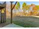 Spacious backyard with mature trees and grassy area at 2606 Wyntercrest Ln, Durham, NC 27713