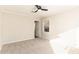 Well-lit bedroom featuring carpet and a ceiling fan at 3015 E Brinkley Dr, Spring Lake, NC 28390