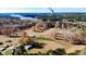 Aerial view of property showing land, multiple storage containers, and a home at 4216 New Hill Holleman Rd, New Hill, NC 27562