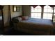 Bedroom with double bed and large windows at 4713 Nc Hwy 87, Graham, NC 27253