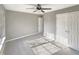 Spacious bedroom with double doors and ceiling fan at 6 Heatherford Ct, Durham, NC 27704