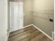 Laundry room with shelving, flooring and access to exterior at 6 Heatherford Ct, Durham, NC 27704