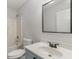 Small bathroom with a blue vanity, toilet and shower/tub combo at 602 Dogwood St, Fuquay Varina, NC 27526