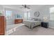 Large main bedroom with a king-size bed and dresser at 628 Peach Orchard Pl Pl, Cary, NC 27519